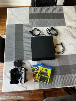 PS4 1TB Slim (Black) + 2 controllers