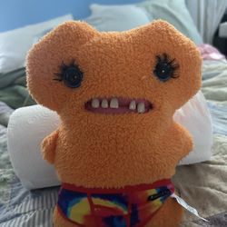 Fuggler plush, specifically the Budgie Gaptooth McGoo edition