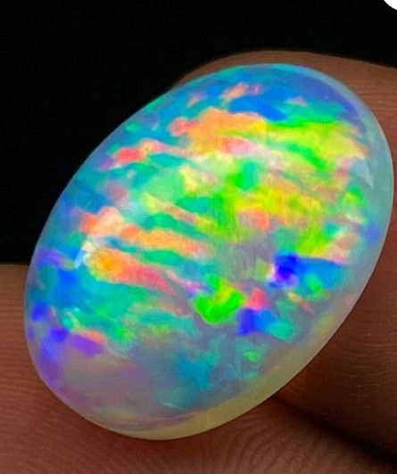 1.75 Cts. Harlequin Rain Ow Flash Opal Oval Cab