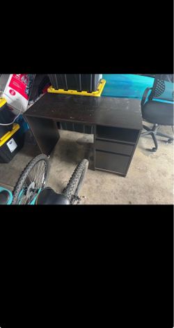 Black desk with drawers