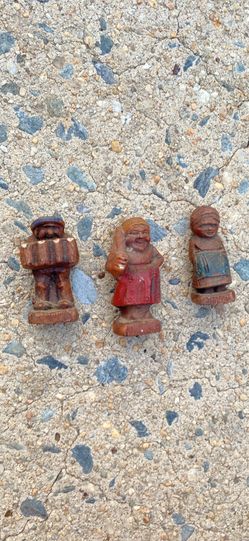 vintage Munich Beer character figurines, dating from around the 1900s to the mid-20th century