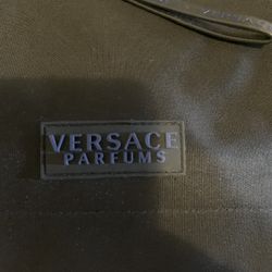 Versace big tote bag never used brand new still in the bag has the cloth bag and the shoulder strap