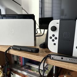 Nintendo switch Oled (New) With An Included Cartridge For pokken Tournament DX