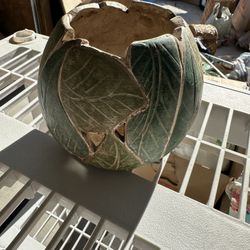 This is a Vintage Large Pottery Vase with a banana leaves carved design and green finish