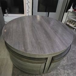 Ottoman With Rolling Footrests And Storage