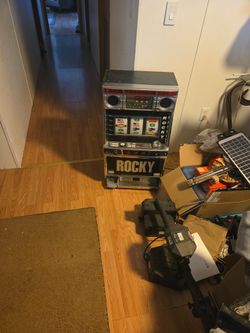 It is a Rocky slot machine.
I don't know whether it works or not