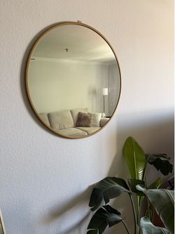Circle gold wall mirror