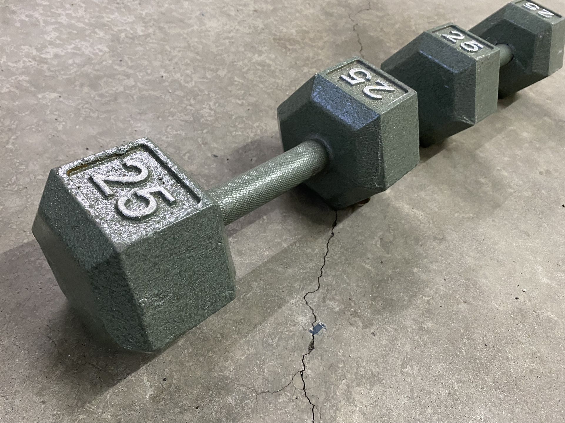 Set Of 25 Pound Iron Dumbbells