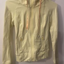 Yellow Lululemon Athletica zip-up hoodie
