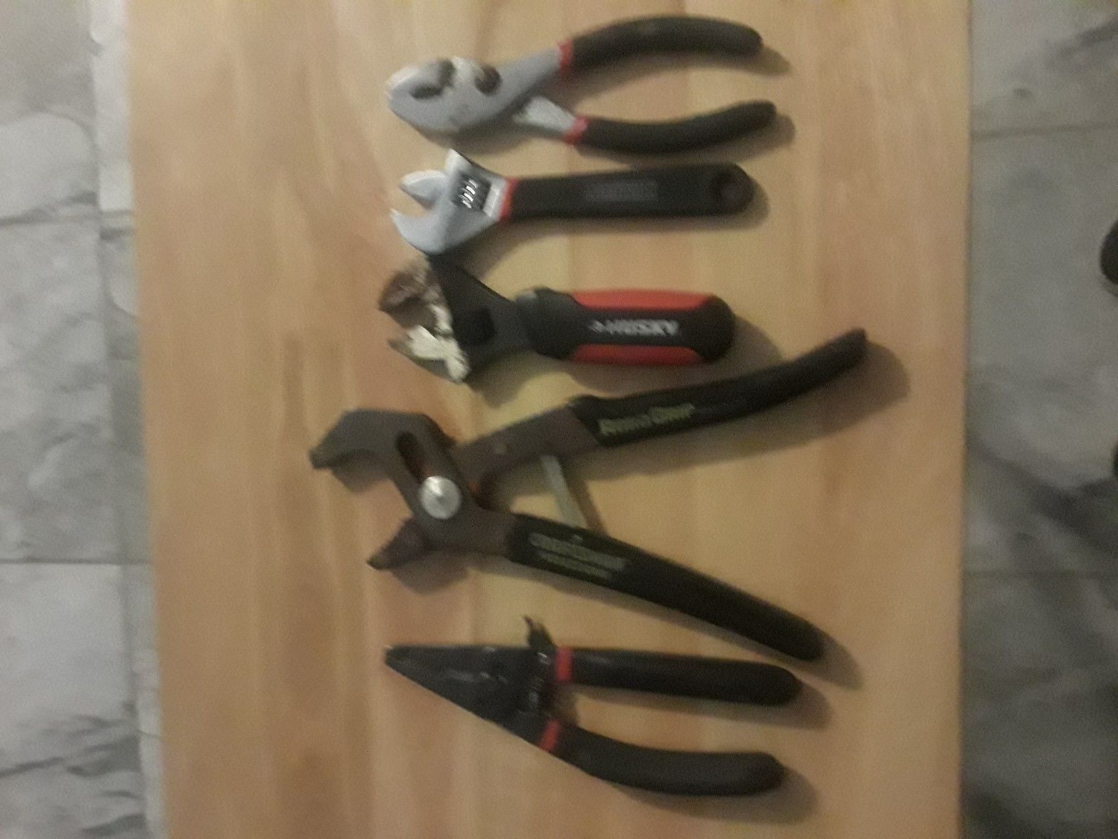 Robo grip pliers, husky wrench , wire stripper