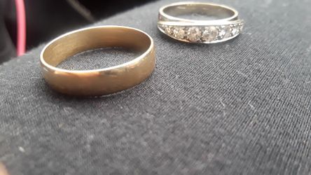 2 gold rings one with real diamonds