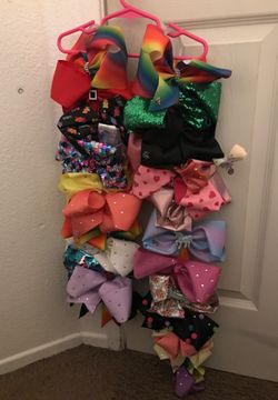 Jojo Siwa collection bows and bow holder