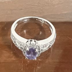 14K WHITE GOLD RING WITH PERIWINKLE STONE AND DIAMONDS. 14k stamp on. Size 6.