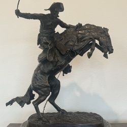 The Bronco Buster by Frederic Remington