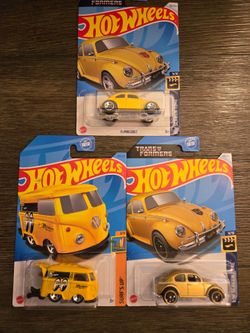 Hot Wheels 2 Transformers in Yellow and Gold and 1 Kool Kombi in Yellow