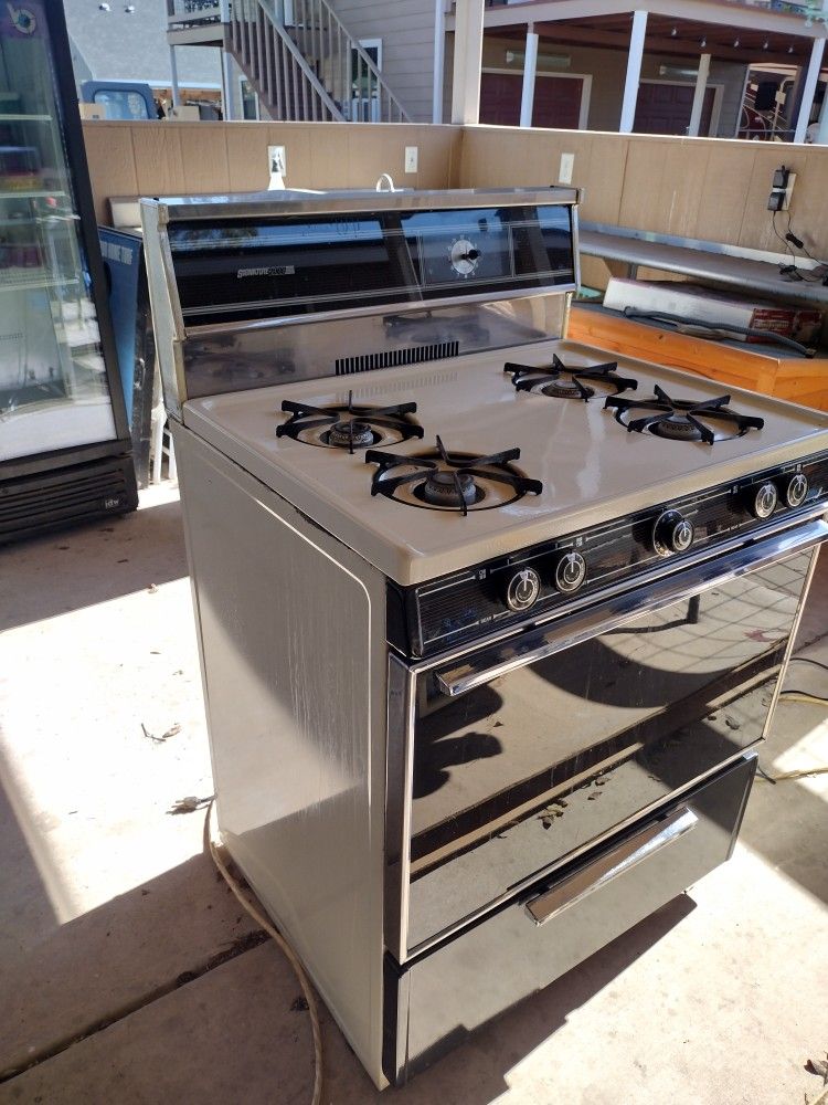 FREE  FREE Metal. GAS STOVE -almond/Black Color 