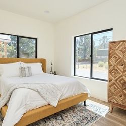 Maloken Queen Wingback Upholstered Platform Bed