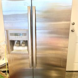 Whirlpool Refrigerator.  30” Deep; 68” Tall; 35.5 Wide 