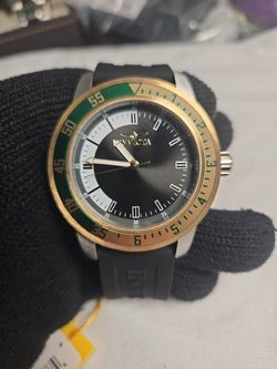 Invicta Watch with Green and Gold Bezel