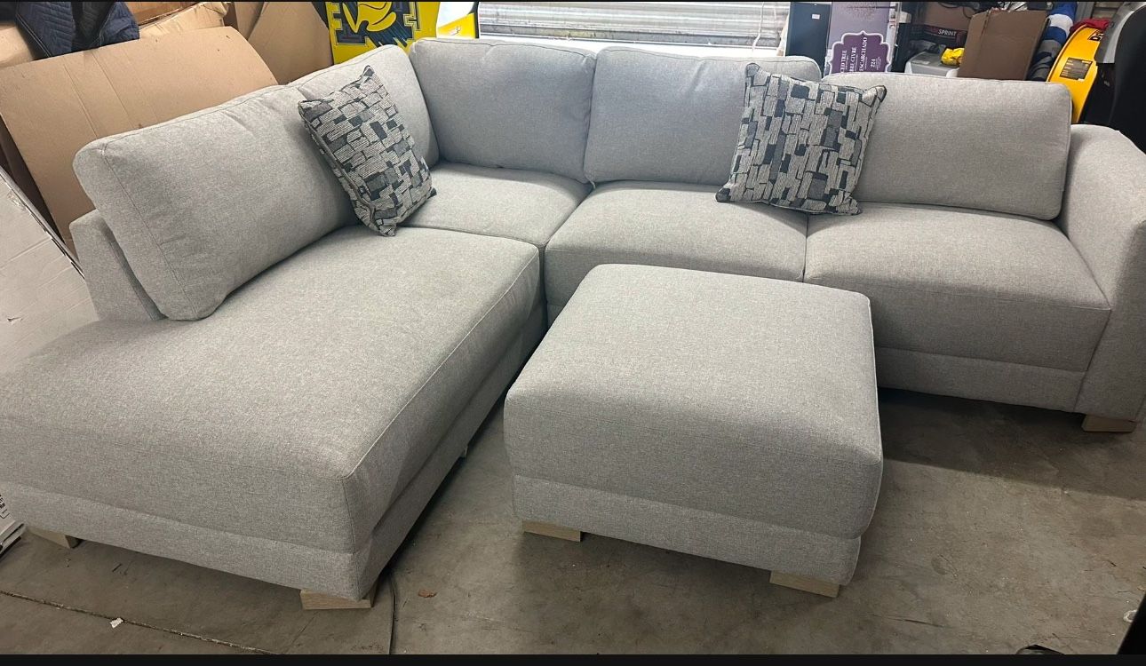 New Drayden Fabric Sectional with Ottoman Retails for over $1,400 Features: Pocket Coil Seat Cushion Sinuous Spring Seat Support Solid Wood Legs Inc
