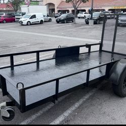 12ft Utility trailer With ramp and tool box storage