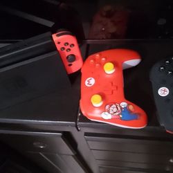 Nintendo Switch And 2 Extra Controllers