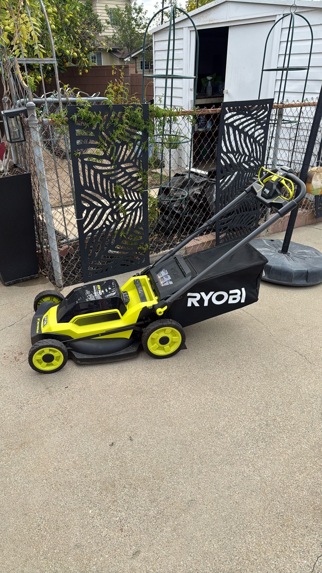Ryobi 20” Self Propelled. 40 V Chargeable Lawnmower. Paid $600. Used Three Times.