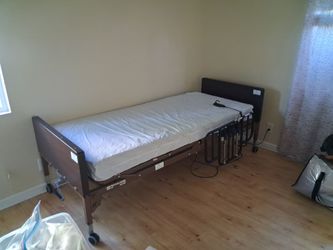 3 MONTH OLD HOSPITAL BED WITH REMOTE CONTROL