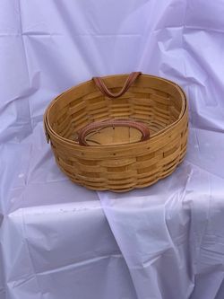 39$ Vintage numbered LONGENBERGER round basket with leather handles.
