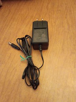 Black AC Power Adapter with DC Barrel Connector