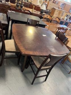 Dark brown tall counter height dining table and chairs (in store)