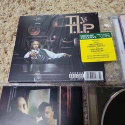 T.I. vs T.I.P. CD Autographed