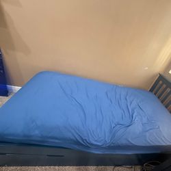 Giving Away  Twin blue trundle Bed