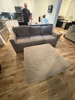 BRAND NEW COUCH WITH MATRESS INSIDE THAT FOLDS OUT