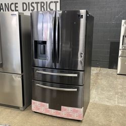 Samsung black stainless steel four-door French door refrigerator