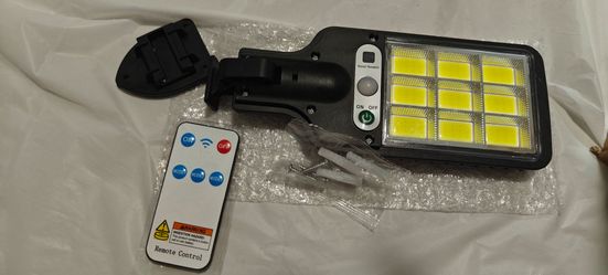 Solar LED Wall Light with Motion Sensor and Remote