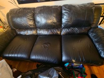 Black leather reclining couch