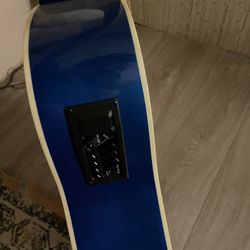 blue and black guitar