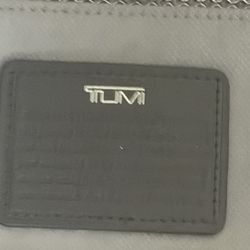 Tumi Suitcase And A Back Pack 