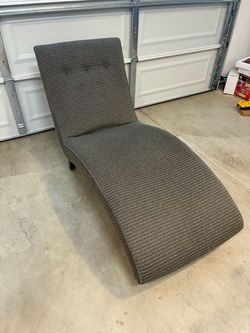 curved indoor upholstered chaise lounge chair by Room and Board