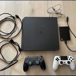 PlayStation 4 With Two Controllers And Games