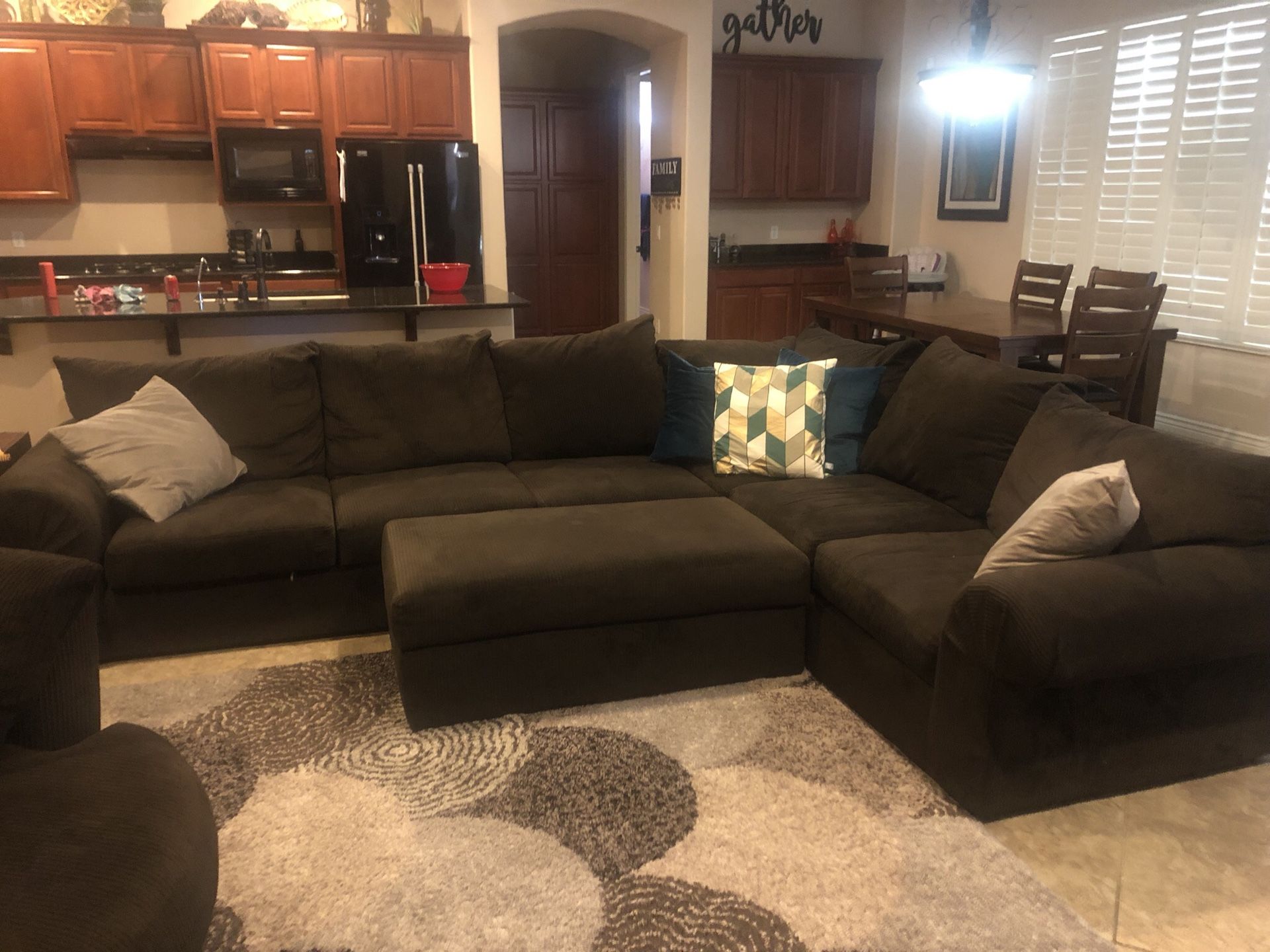 Sectional, roundabout chair, ottoman and dinning room table