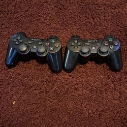 two Ps3 Controllers