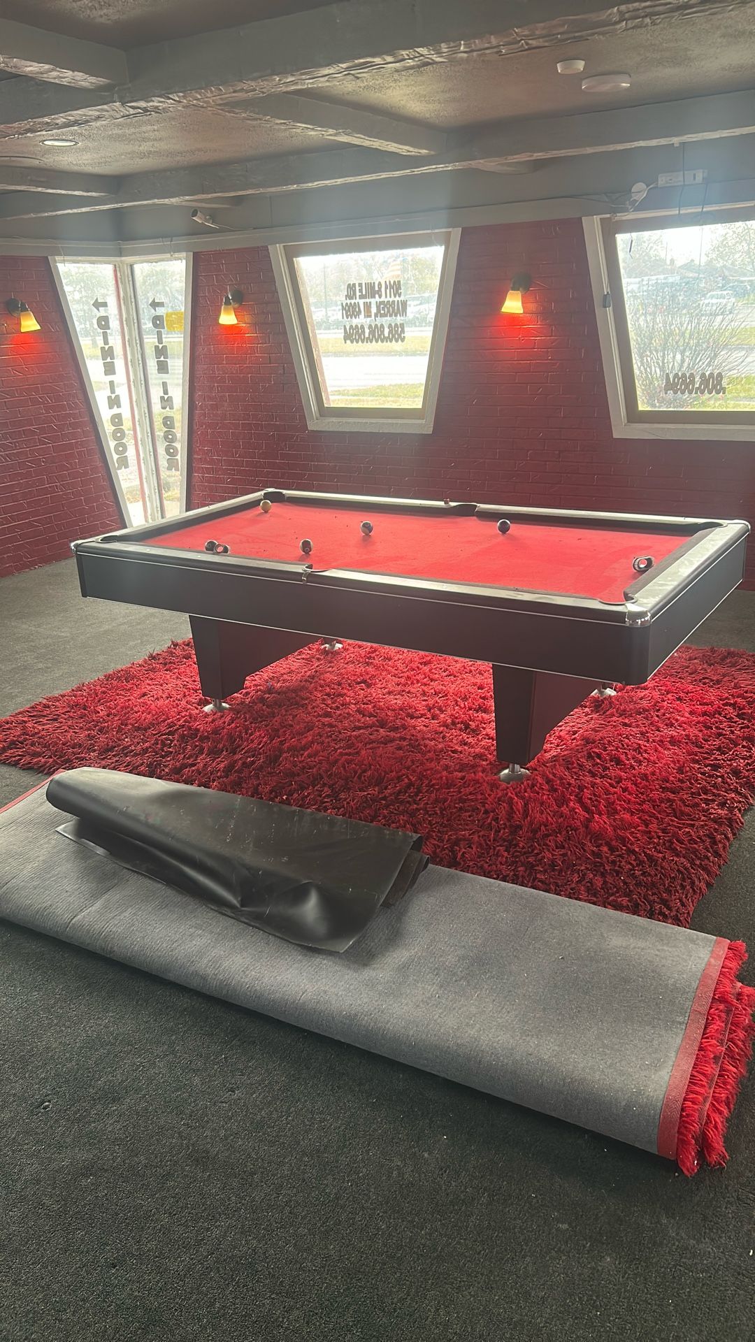 8 Ft. Pool table with sticks