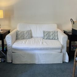 Pull out white sofa 
