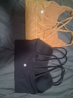 2 Lululemon sports bras tops small or xs