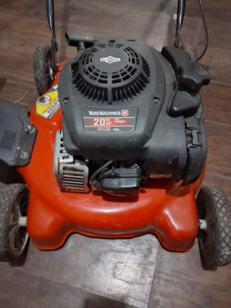 BRIGGS. A STRATTON E. 300 SERIES 20 IN CUTTING WIDTH