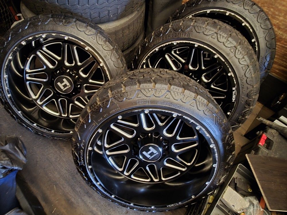 Hostile Sproket 22x12 Rims And Tires