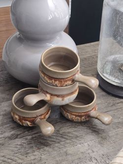 Four vintage Laurentian Pottery French onion soup bowls