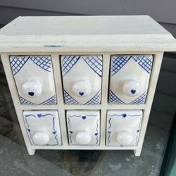 Porcelain 6-Drawer Candle Cabinet.